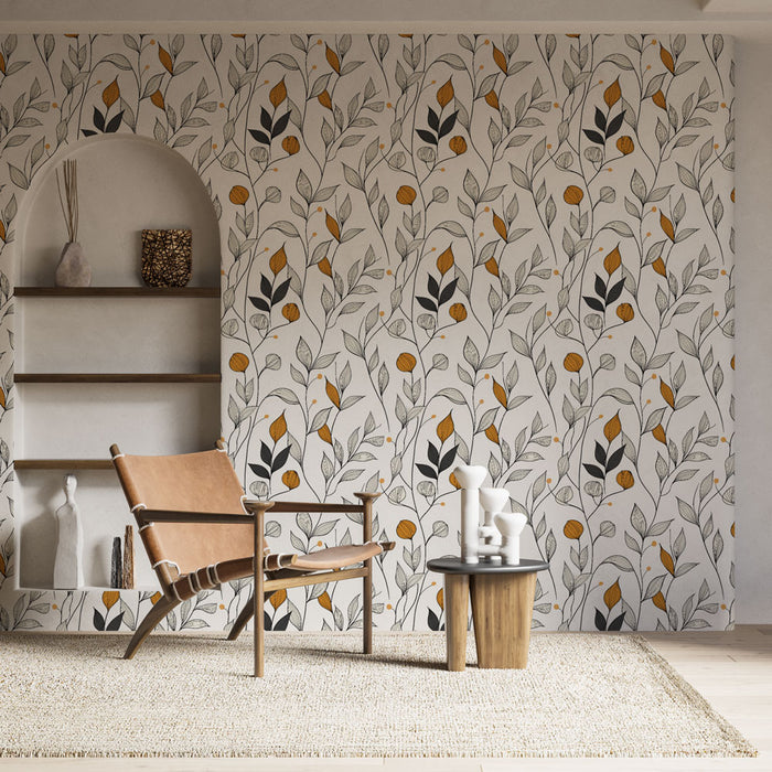 Un salon contemporain avec un papier peint floral aux motifs de feuilles et fleurs en noir, jaune et blanc, créant une atmosphère chaleureuse et accueillante.