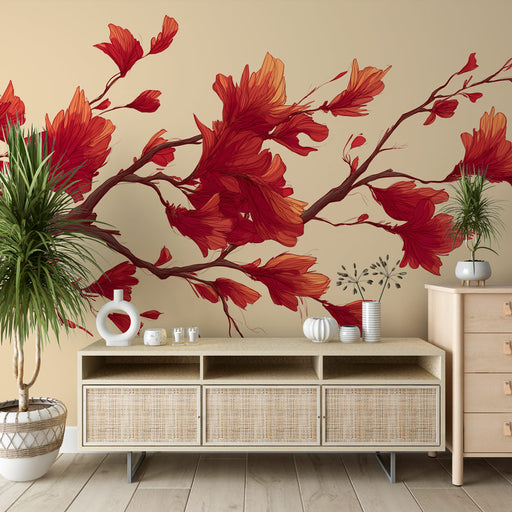 Un salon contemporain avec un papier peint floral aux grandes branches rouge et orange sur fond beige, créant une ambiance chaleureuse et dynamique.