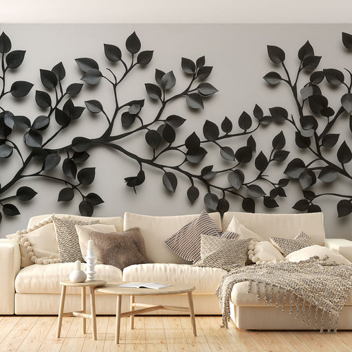 Papier peint branches élégantes avec motif en relief de feuillage noir et gris pour salon moderne.