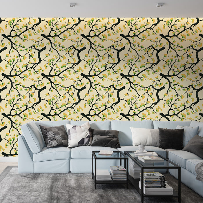 Un salon moderne avec un papier peint floral aux motifs de branches noires ornées de fleurs jaunes et de feuilles vertes sur fond crème, créant une ambiance chaleureuse et accueillante.