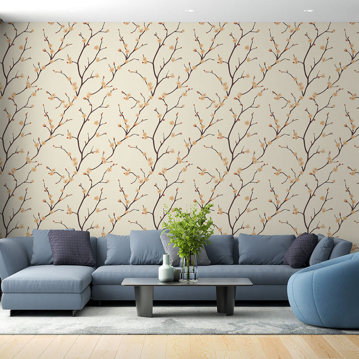 Un salon moderne avec un papier peint floral beige aux motifs de branches délicates et fleurs dorées, créant une ambiance douce et apaisante.