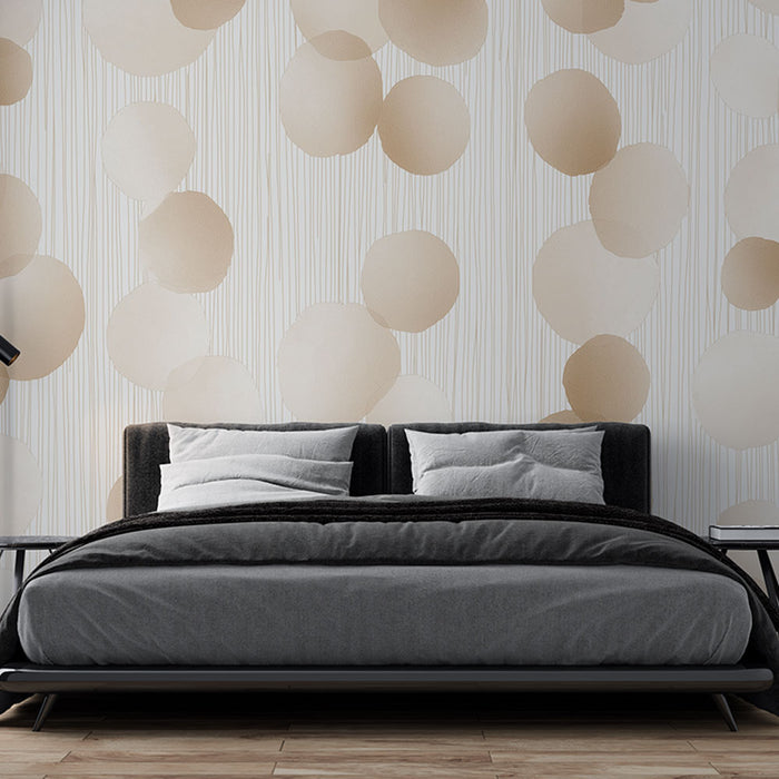 Une chambre moderne avec un papier peint aux motifs de cercles beiges sur fond clair, créant une atmosphère douce et apaisante.