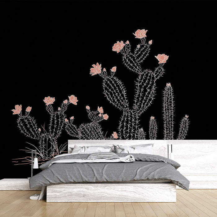 Une chambre moderne avec un papier peint représentant des cactus en contours blancs et fleurs roses sur fond noir, créant une ambiance audacieuse et contemporaine.