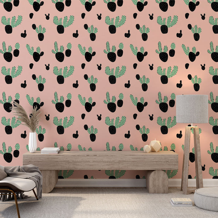 Une salle de séjour moderne avec un papier peint rose illustré de cactus noirs et verts, créant une ambiance ludique et chaleureuse.