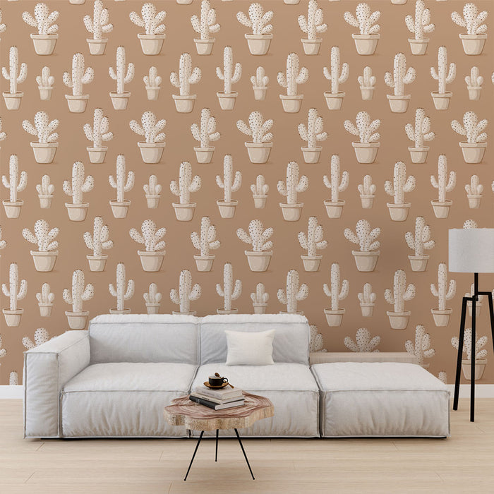 Un salon moderne avec un papier peint beige orné de cactus en pots aux motifs délicats, créant une ambiance chaleureuse et naturelle.