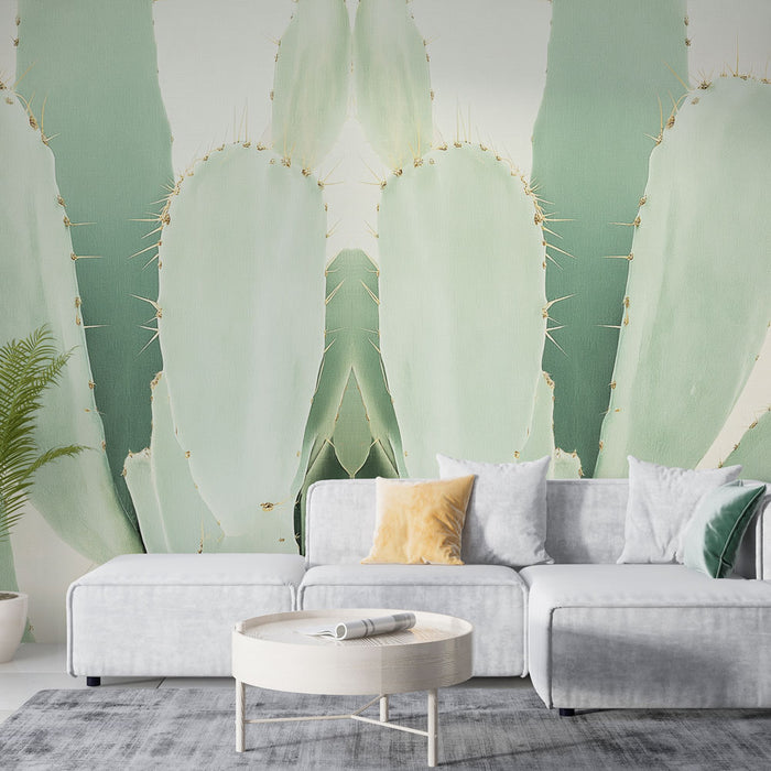 Un salon moderne avec un papier peint représentant de grands cactus aux teintes vertes douces, créant une ambiance naturelle et apaisante.