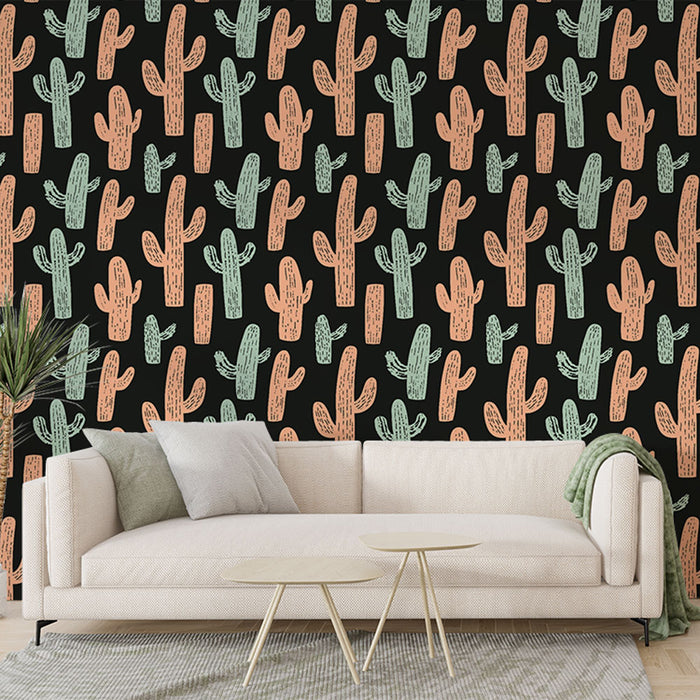 Un salon contemporain avec un papier peint noir orné de cactus stylisés en teintes pastel, créant une ambiance dynamique et originale.