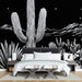 Papier peint paysage désertique monochrome avec cactus et montagnes pour chambre moderne.