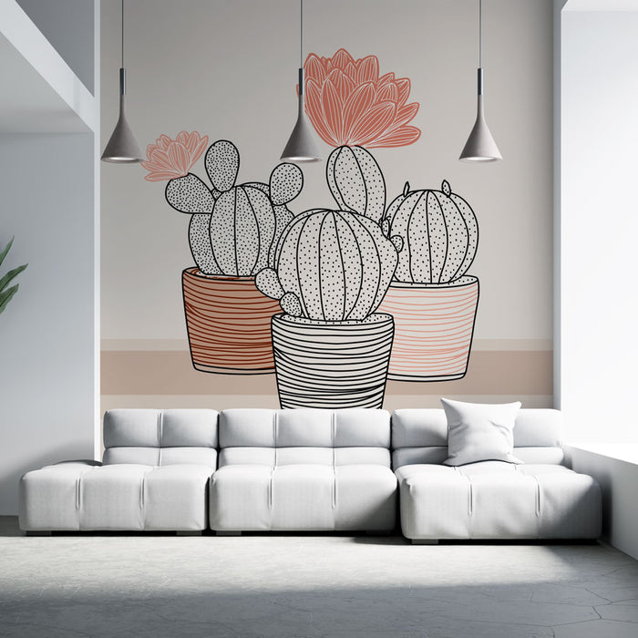 Un salon moderne avec un papier peint illustrant des cactus stylisés en noir et rose, créant une ambiance fraîche et contemporaine.
