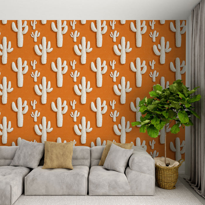 Un salon contemporain avec un papier peint orange vibrant orné de cactus blancs, créant une ambiance chaleureuse et accueillante.
