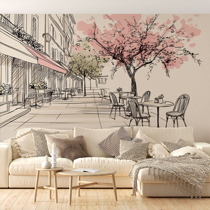 Une salle de séjour chaleureuse avec un papier peint illustrant une terrasse animée, des arbres en fleurs et des bâtiments en esquisse, créant une atmosphère romantique et paisible.