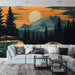 Un salon moderne avec un papier peint représentant un paysage montagneux au coucher de soleil, mêlant des teintes orange et vert foncé, évoquant une ambiance aventureuse et apaisante.