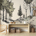 Une pièce lumineuse avec un papier peint illustratif représentant des arbres en noir et blanc sur un fond beige, créant une ambiance naturelle et apaisante.