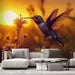 Papier peint colibri en plein vol au coucher du soleil pour salon moderne et élégant