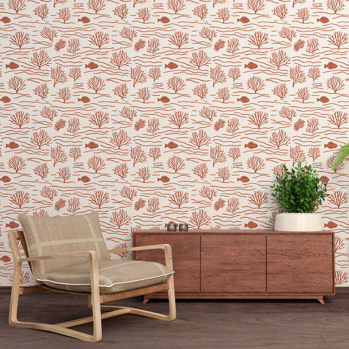 Une pièce moderne avec un papier peint représentant des motifs marins en terracotta sur fond clair, évoquant une ambiance naturelle et apaisante.