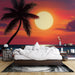 Une chambre moderne avec un papier peint tropical représentant un coucher de soleil vibrant sur la mer, évoquant une ambiance chaleureuse et relaxante.