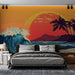 Une chambre moderne avec un papier peint représentant une scène tropicale colorée, où une grande vague turquoise se brise sous un coucher de soleil flamboyant.