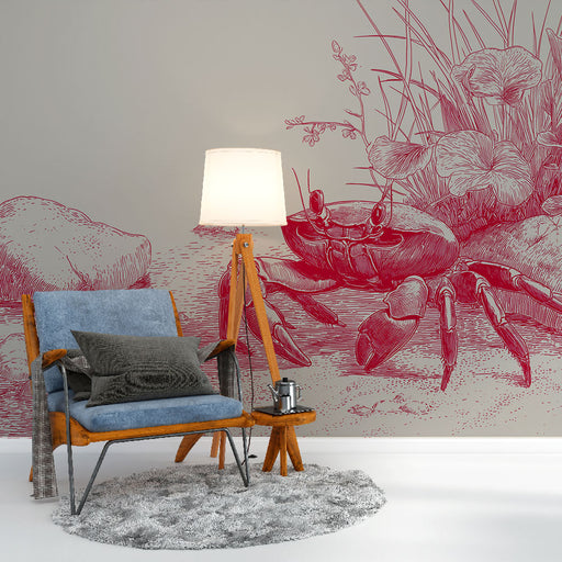 Une pièce moderne avec un papier peint illustrant un crabe en rouge sur fond gris, créant une atmosphère artistique et marine.