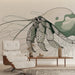 Une pièce de vie moderne avec un papier peint illustrant un crustacé stylisé aux traits fins et aux teintes vertes, créant une ambiance artistique et originale.