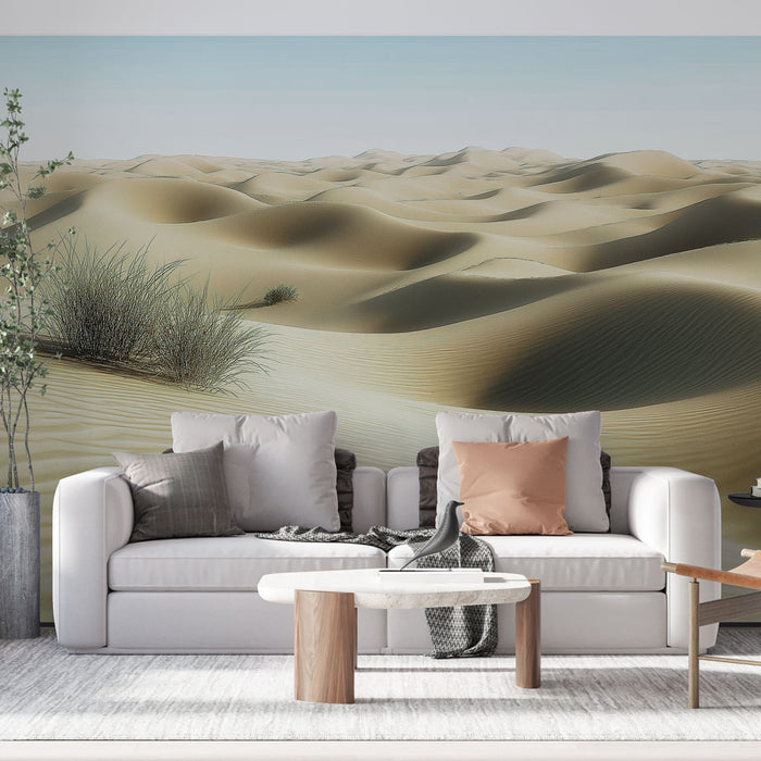 Un salon moderne avec un papier peint représentant des dunes de sable doré sous un ciel clair, évoquant une ambiance sereine et naturelle.