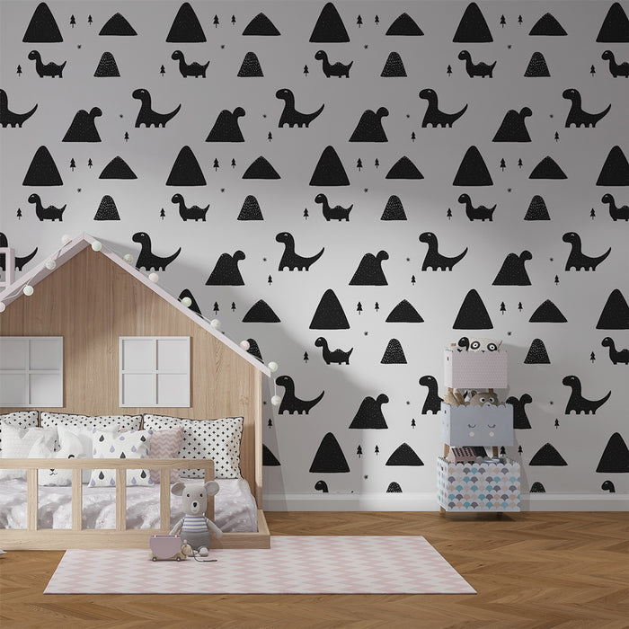 Une chambre d'enfant avec un papier peint ludique noir et blanc représentant des dinosaures et des montagnes, créant une ambiance joyeuse et imaginative.