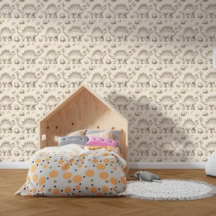 Une chambre d'enfant avec un papier peint illustré de dinosaures en noir sur fond beige, créant une ambiance ludique et imaginative.