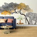 Un salon moderne avec un papier peint artistique représentant un éléphant stylisé et des arbres aux teintes dorées et grises, créant une ambiance élégante et apaisante.