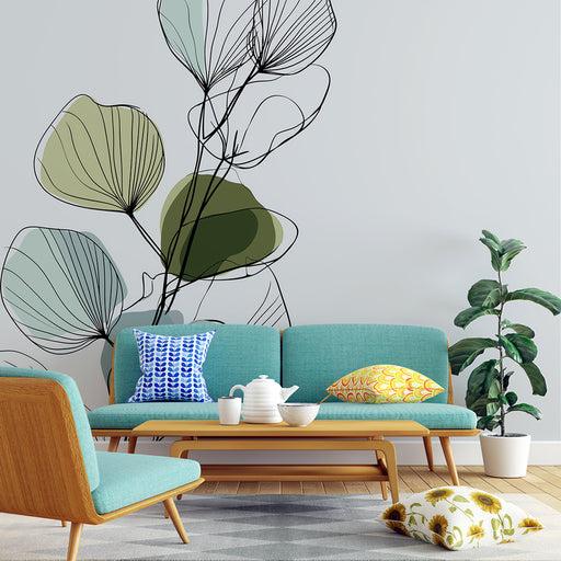 Un salon moderne avec un papier peint représentant des feuilles stylisées aux teintes vertes et bleues, créant une ambiance fraîche et apaisante.