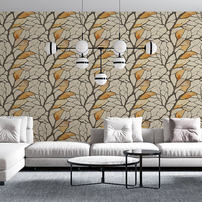 Un salon moderne avec un papier peint aux motifs de branches stylisées en beige et orange, créant une ambiance chaleureuse et accueillante.