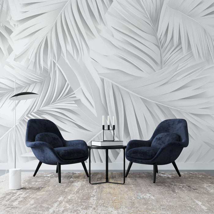 Une salle de séjour moderne avec un papier peint texturé représentant des feuilles blanches en relief, créant une atmosphère élégante et apaisante.