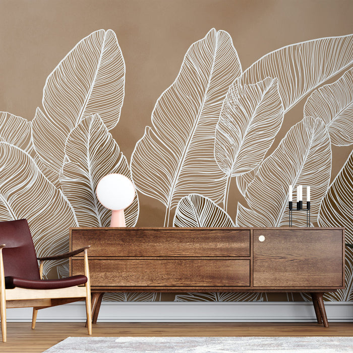 Une pièce moderne avec un papier peint représentant de grandes feuilles blanches sur fond marron, créant une atmosphère chaleureuse et naturelle.