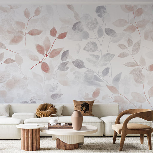 Papier peint feuillage délicat avec motif de feuilles légères aux teintes pastel pour salon élégant