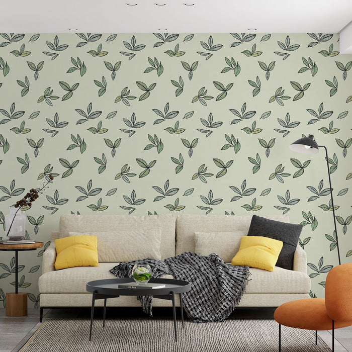 Un salon moderne avec un papier peint aux motifs de feuilles délicates sur fond vert clair, créant une ambiance naturelle et apaisante.
