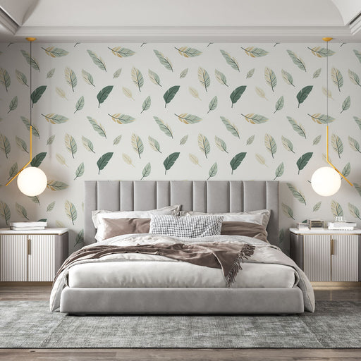 Une chambre moderne avec un papier peint délicat représentant des feuilles vertes et dorées sur fond clair, créant une atmosphère apaisante et naturelle.