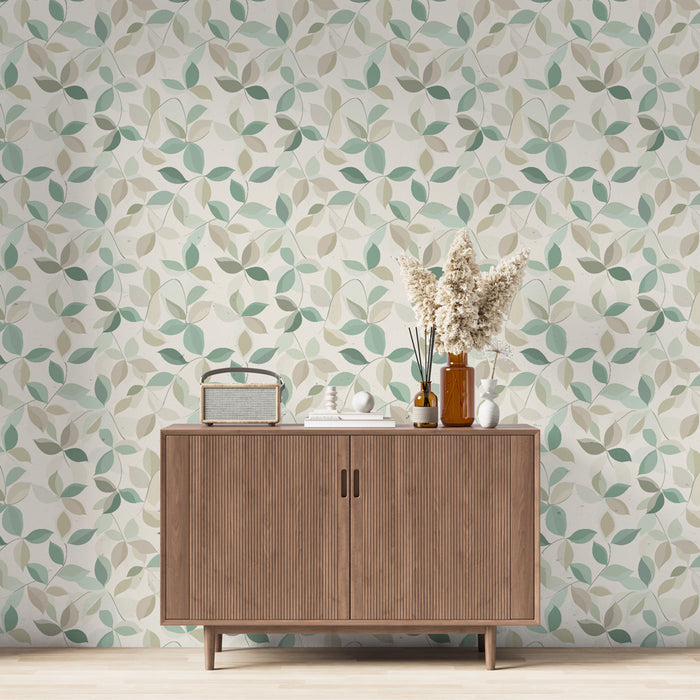 Une pièce moderne avec un papier peint aux motifs de feuilles délicates dans des teintes vertes et beige, créant une ambiance naturelle et apaisante.