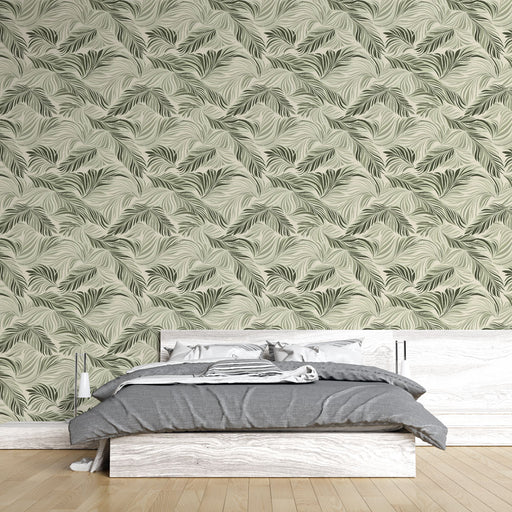 Une chambre moderne avec un papier peint aux motifs de feuilles délicates dans des teintes vertes sur fond clair, créant une atmosphère apaisante et naturelle.