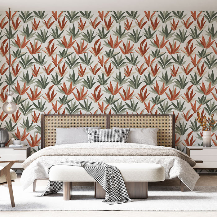 Une chambre moderne avec un papier peint aux motifs botaniques dans des teintes de vert et d'orange sur fond clair, créant une ambiance chaleureuse et naturelle.