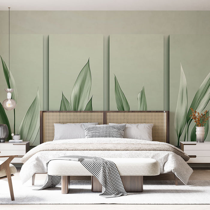 Une chambre élégante avec un papier peint vert pâle illustrant de grandes feuilles délicates, créant une atmosphère apaisante et naturelle.