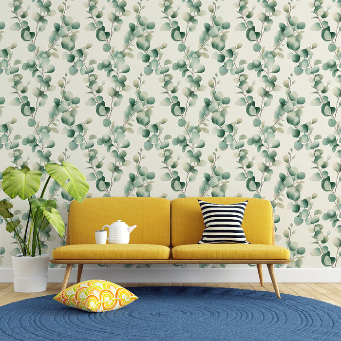 Un salon lumineux avec un papier peint floral aux motifs de feuilles vertes sur fond clair, créant une ambiance naturelle et apaisante.