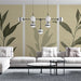 Un salon moderne avec un papier peint aux motifs de grandes feuilles vertes sur fond beige, créant une atmosphère apaisante et naturelle.