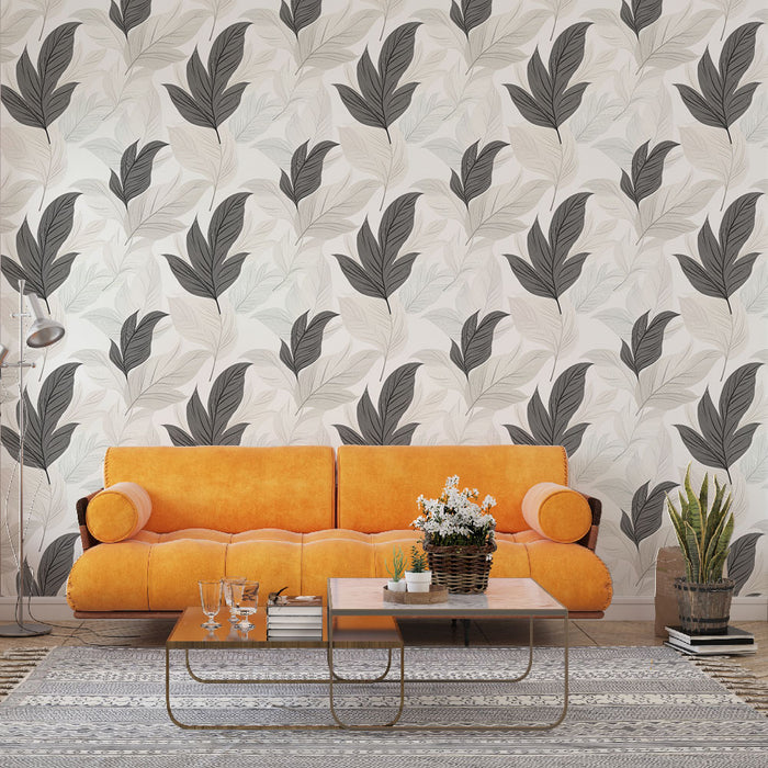 Une pièce moderne avec un papier peint aux motifs de feuilles stylisées en noir et gris sur fond clair, créant une ambiance élégante et apaisante.