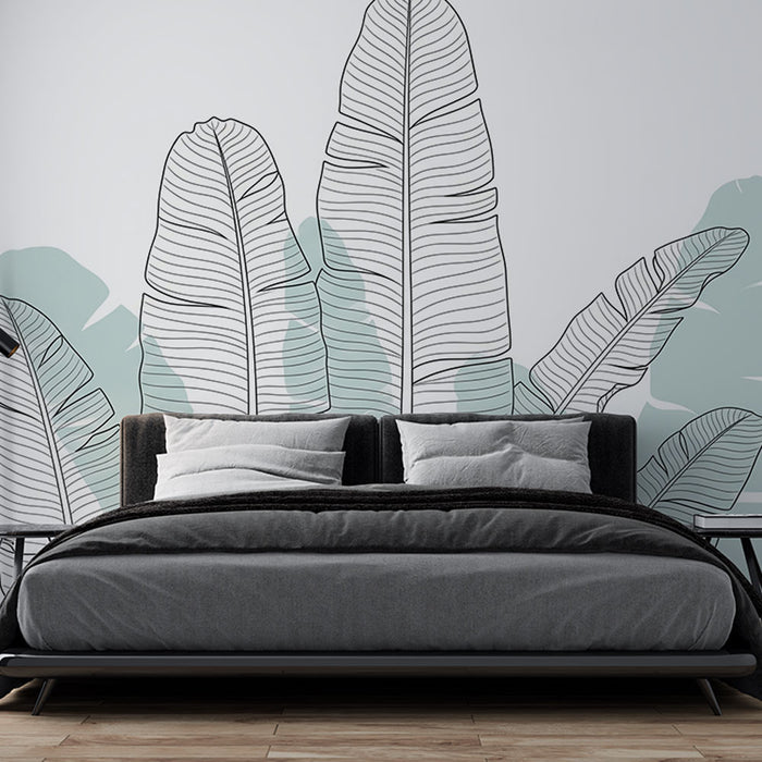 Une chambre moderne avec un papier peint représentant de grandes feuilles stylisées en noir sur fond pastel, créant une ambiance apaisante et naturelle.