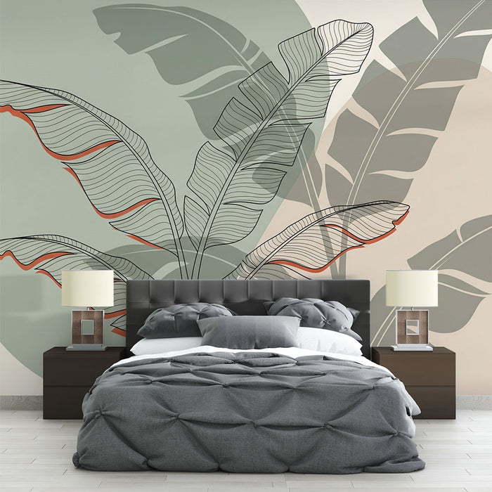 Une chambre moderne avec un papier peint tropical aux grandes feuilles graphiques dans des teintes douces de vert et beige, créant une atmosphère apaisante et naturelle.