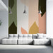 Papier peint moderne avec motifs géométriques de feuilles colorées sur fond clair pour salon contemporain