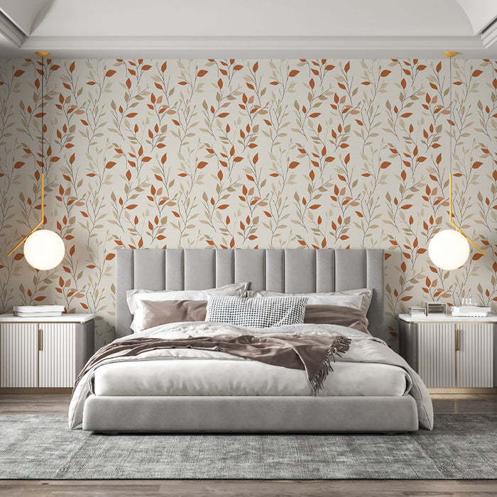 Une chambre élégante avec un papier peint floral aux motifs de feuilles dans des teintes chaudes d'orange et de beige, créant une atmosphère chaleureuse et accueillante.