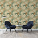 Un salon moderne avec un papier peint aux motifs de feuilles stylisées dans des teintes vertes, brunes et beiges, créant une ambiance naturelle et chaleureuse.