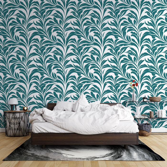 Une chambre moderne avec un papier peint aux motifs de feuilles stylisées turquoise sur fond blanc, créant une ambiance fraîche et dynamique.