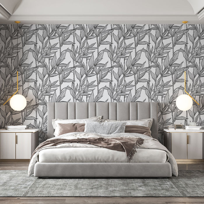 Une chambre moderne avec un papier peint noir et blanc représentant des feuilles stylisées, créant une ambiance élégante et apaisante.