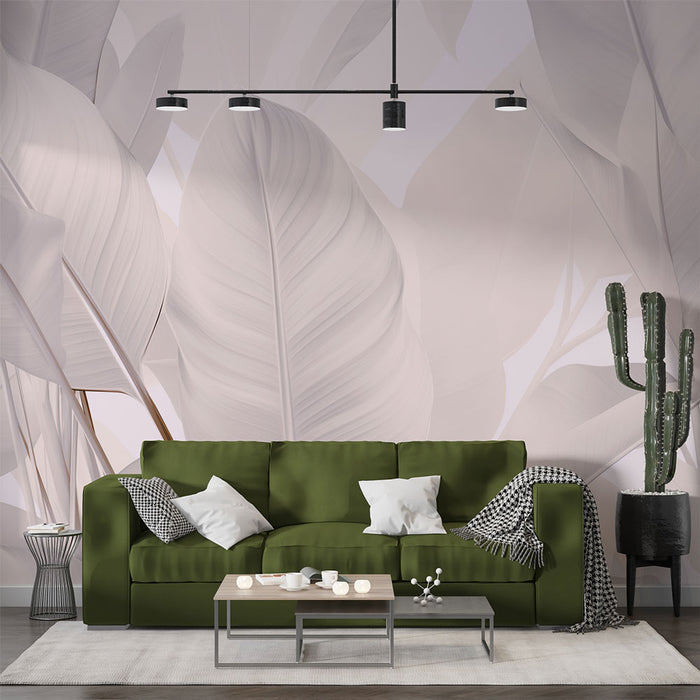 Un salon moderne avec un papier peint représentant de grandes feuilles blanches sur fond pastel, créant une ambiance apaisante et naturelle.