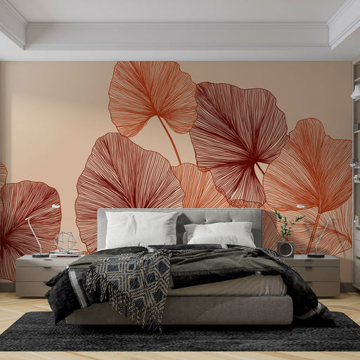 Une chambre moderne avec un papier peint représentant de grandes feuilles stylisées en rouge et orange sur fond beige, créant une ambiance chaleureuse et accueillante.